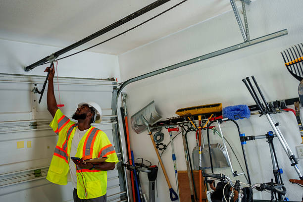Professional Garage Door Roller Replacement technician working in Spencerport, NY